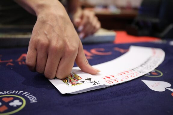 Cards being placed on a table